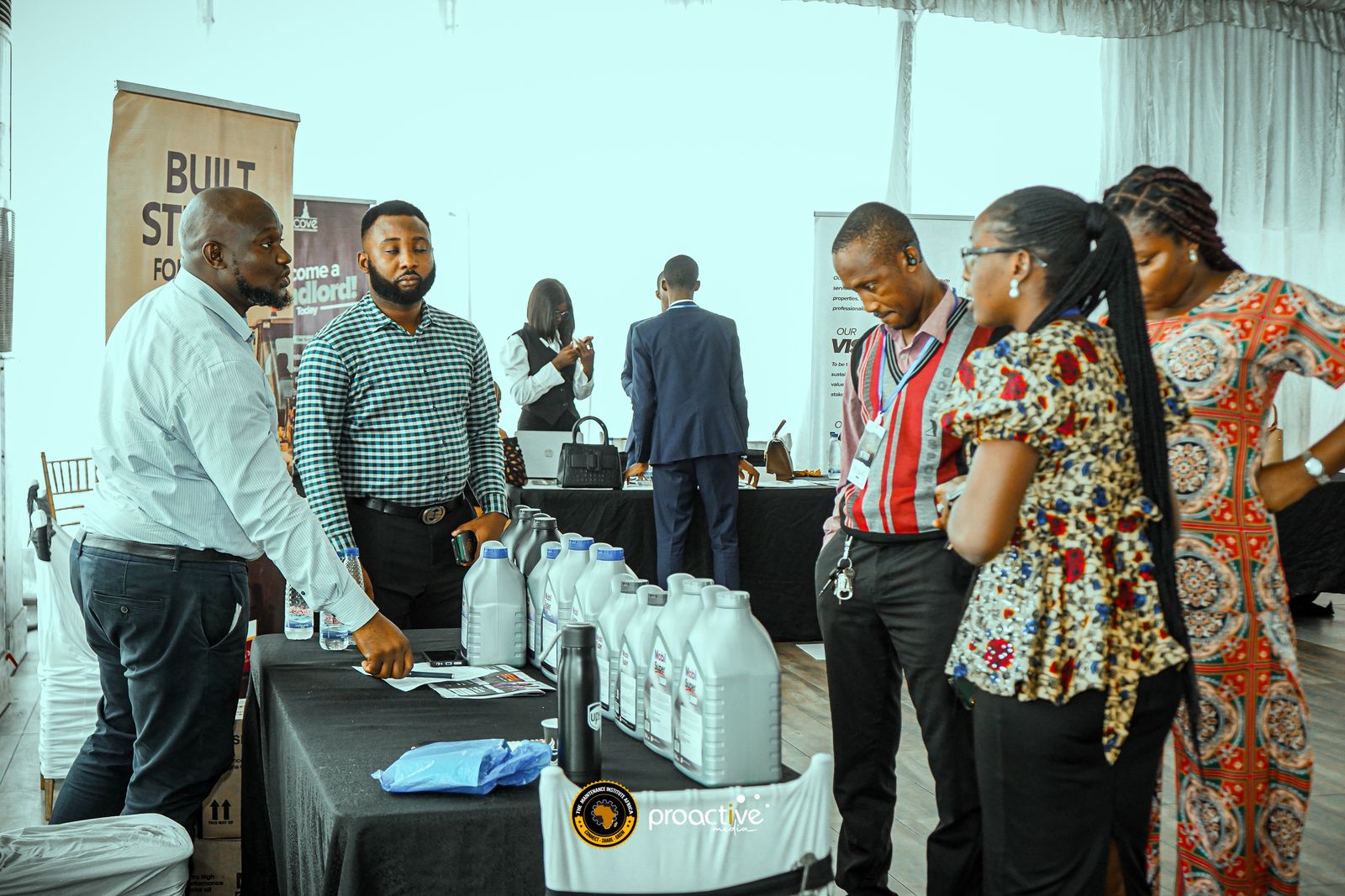 Delegates at an exhibition stand